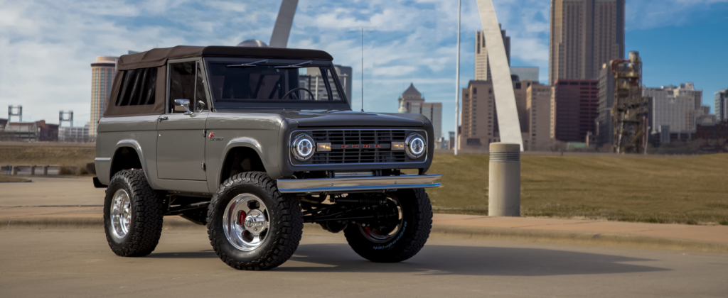 1970 Ford Bronco Coyote Edition in front of the St. Louis Arch.