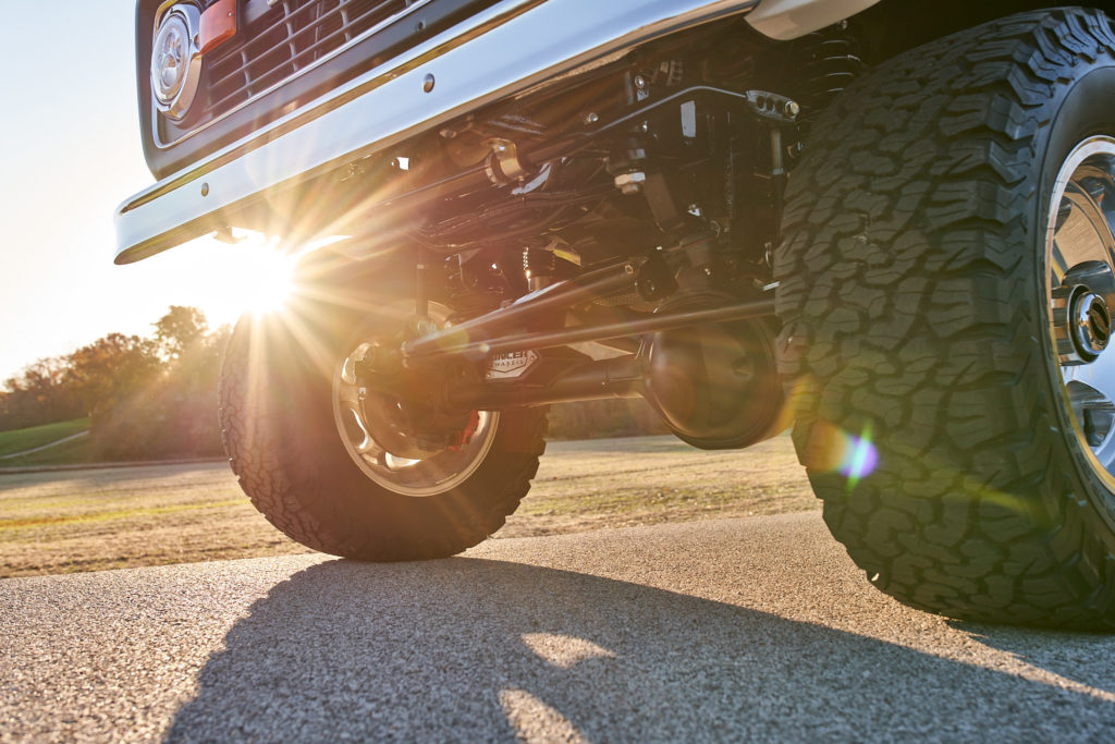 Front view with a sunset of this vintage Ford Bronco.