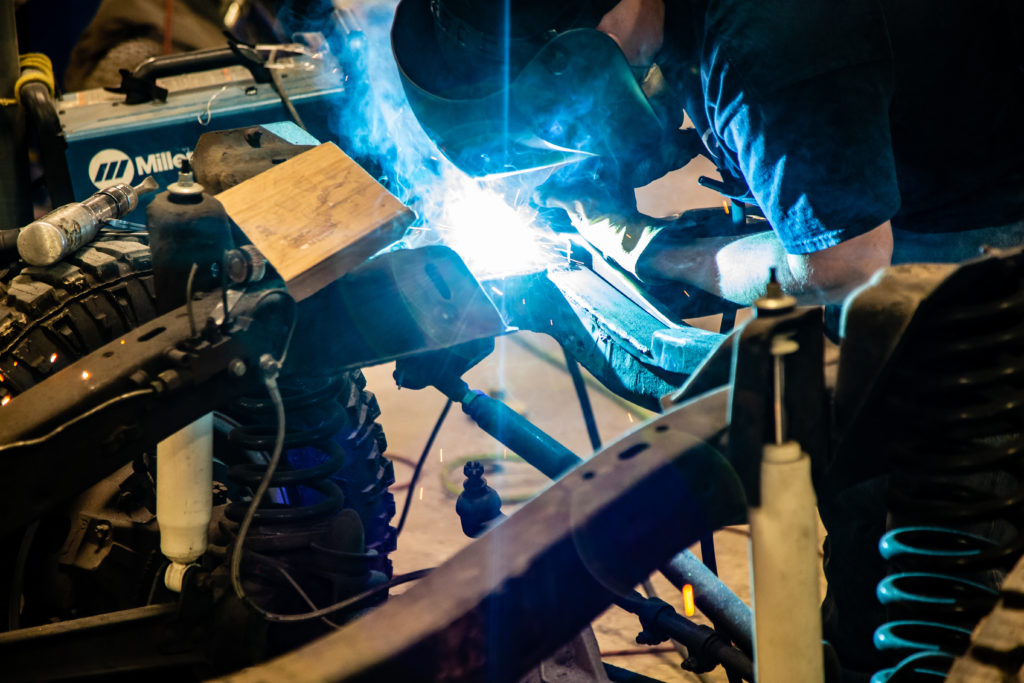 A Gateway Bronco team member busy welding. It's all part of the plan.