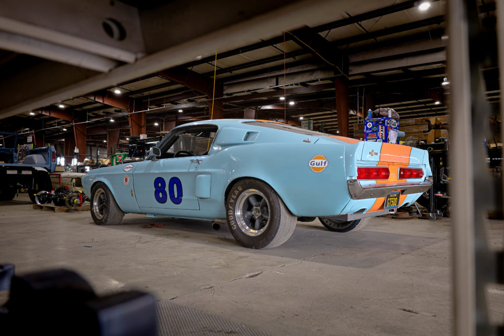 Rear view of a light blue Shelby.