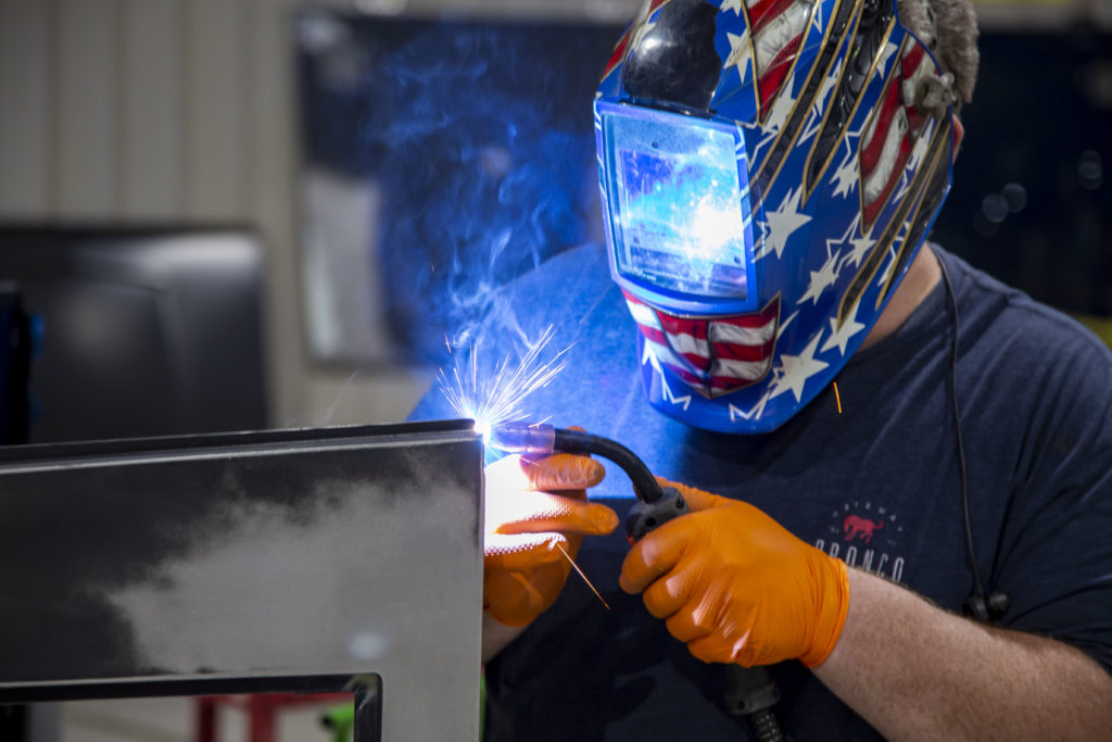 It's all part of the plan. Gateway Bronco team member welding.